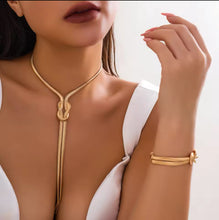 Load image into Gallery viewer, Flat knot gold necklace and bracelet set
