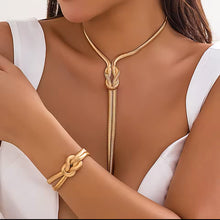 Load image into Gallery viewer, Flat knot gold necklace and bracelet set
